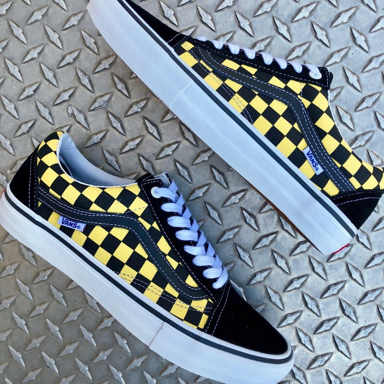 white and gold checkered vans