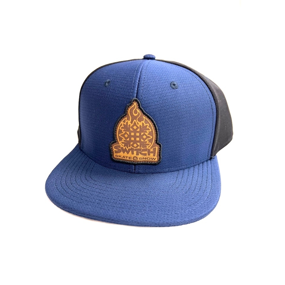 https://www.companybe.com/SwitchSkateboarding/product_photos/rd_images/rd_Switch-Skate-Snow-Burning-Snowflake-Snapback-Hat-Navy-Tech-1.jpg