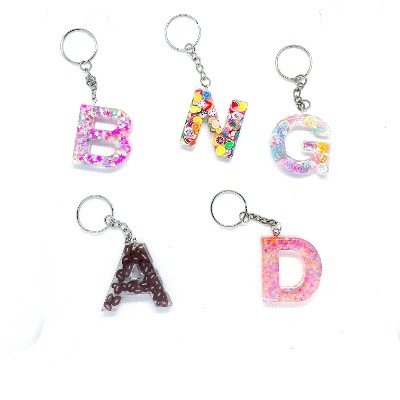 surfside & Co Letter Resin with clay charms pom pon keychain